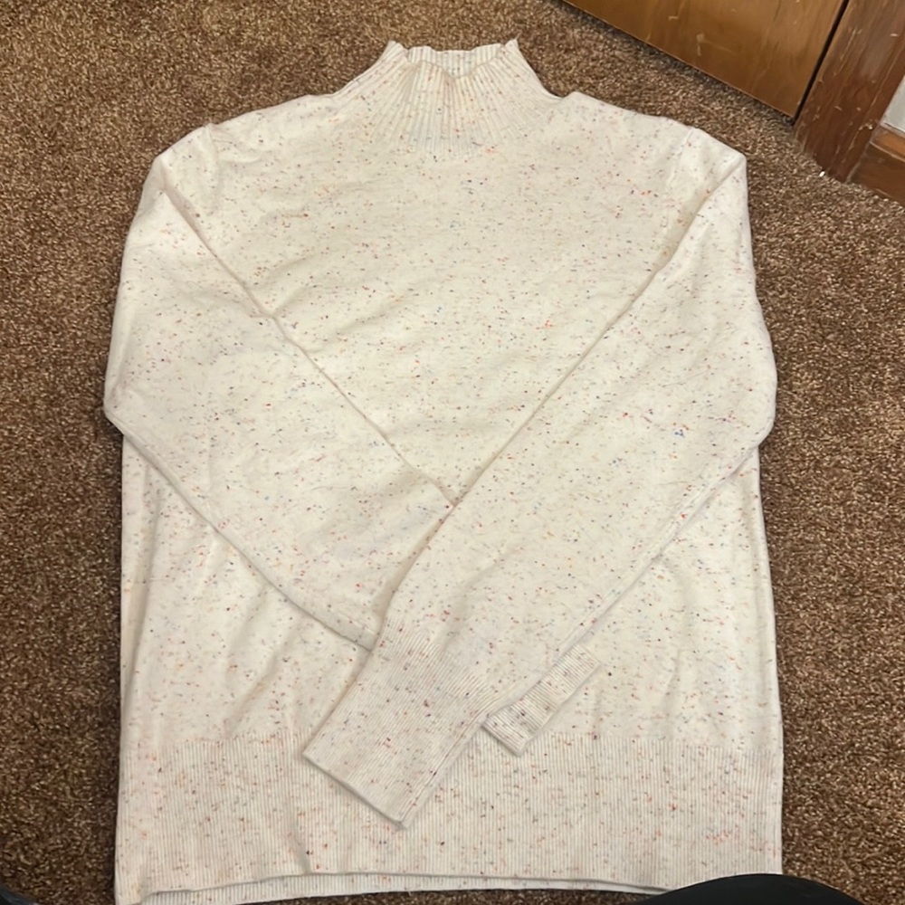 Soft turtle neck cream with multi color flecks! Never worn - Medium.